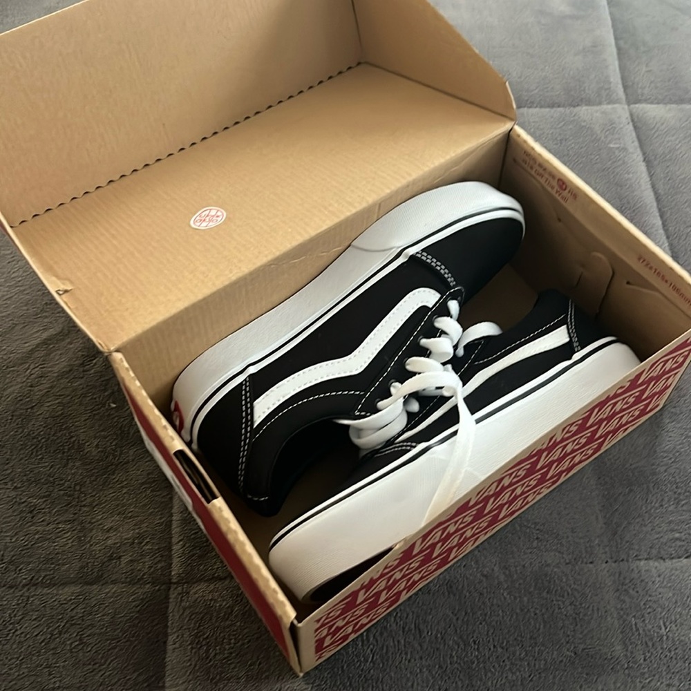 Brand new in the box Vans with the stripe for boys